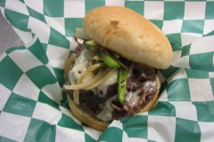 Big Andy -- ¼-pound hamburger topped with Philly steak, sautéed onions, red & green peppers and melted American-Swiss cheese. Available at Andy's Grille, located on Carnes Ave., near Chambers St. (Photo courtesy of the Minnesota State Fair.)
