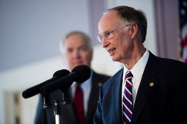 Republican Alabama Governor Robert Bentley (foreground, RIGHT), and Attorney General Luther Strange. Both men were re-elected to their positions in 2010.